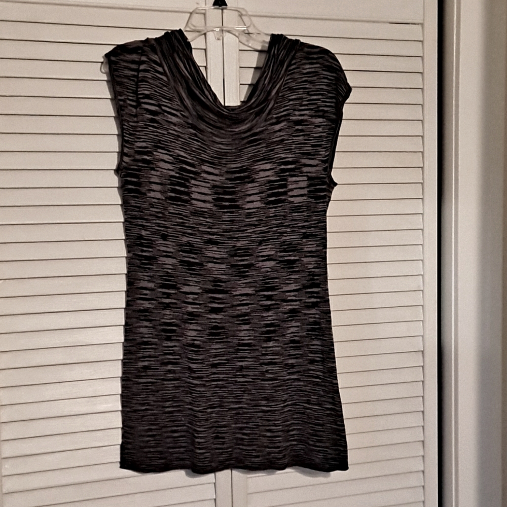 Labeled XL but fits like a Medium